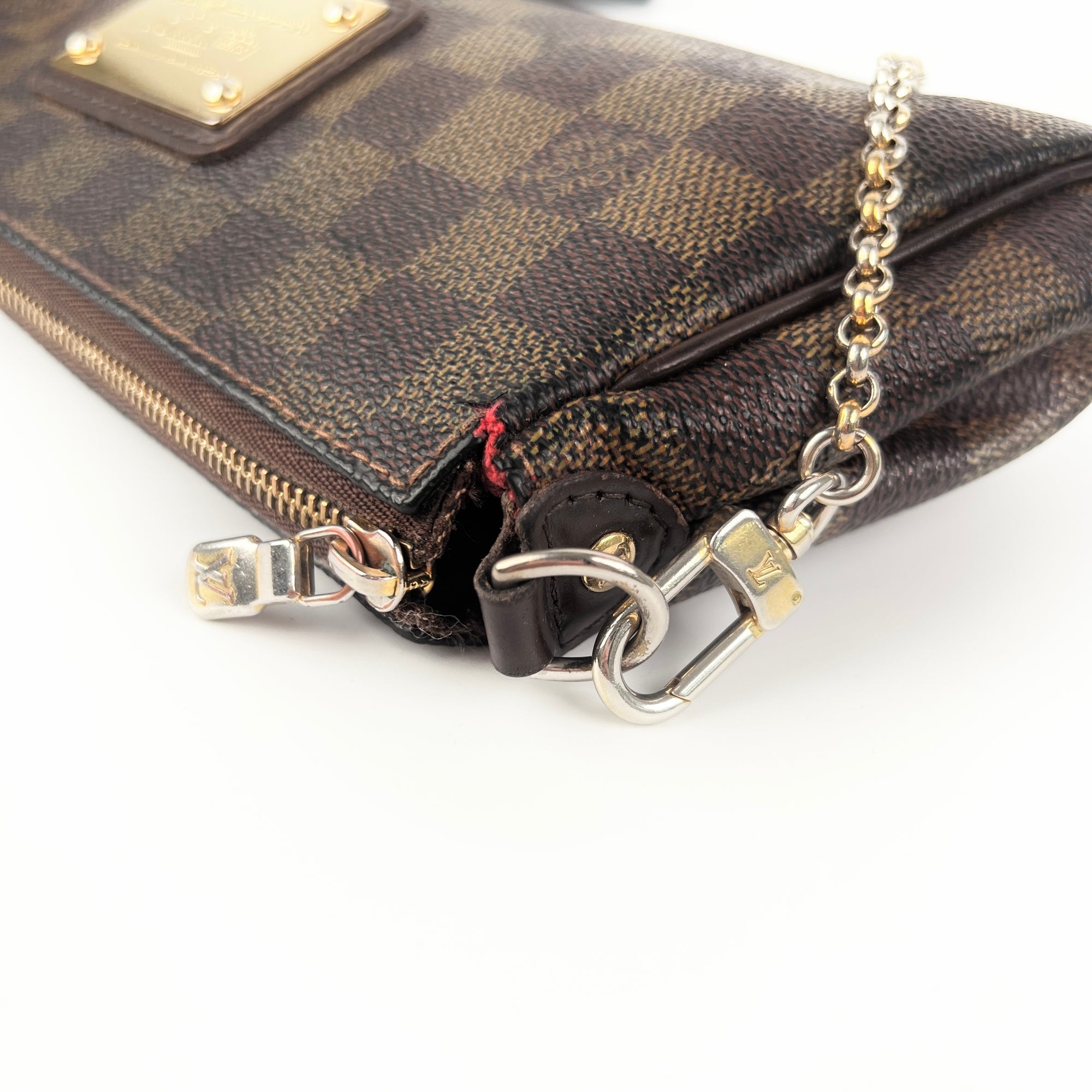 What fits in a louis vuitton pochette and eva clutch 