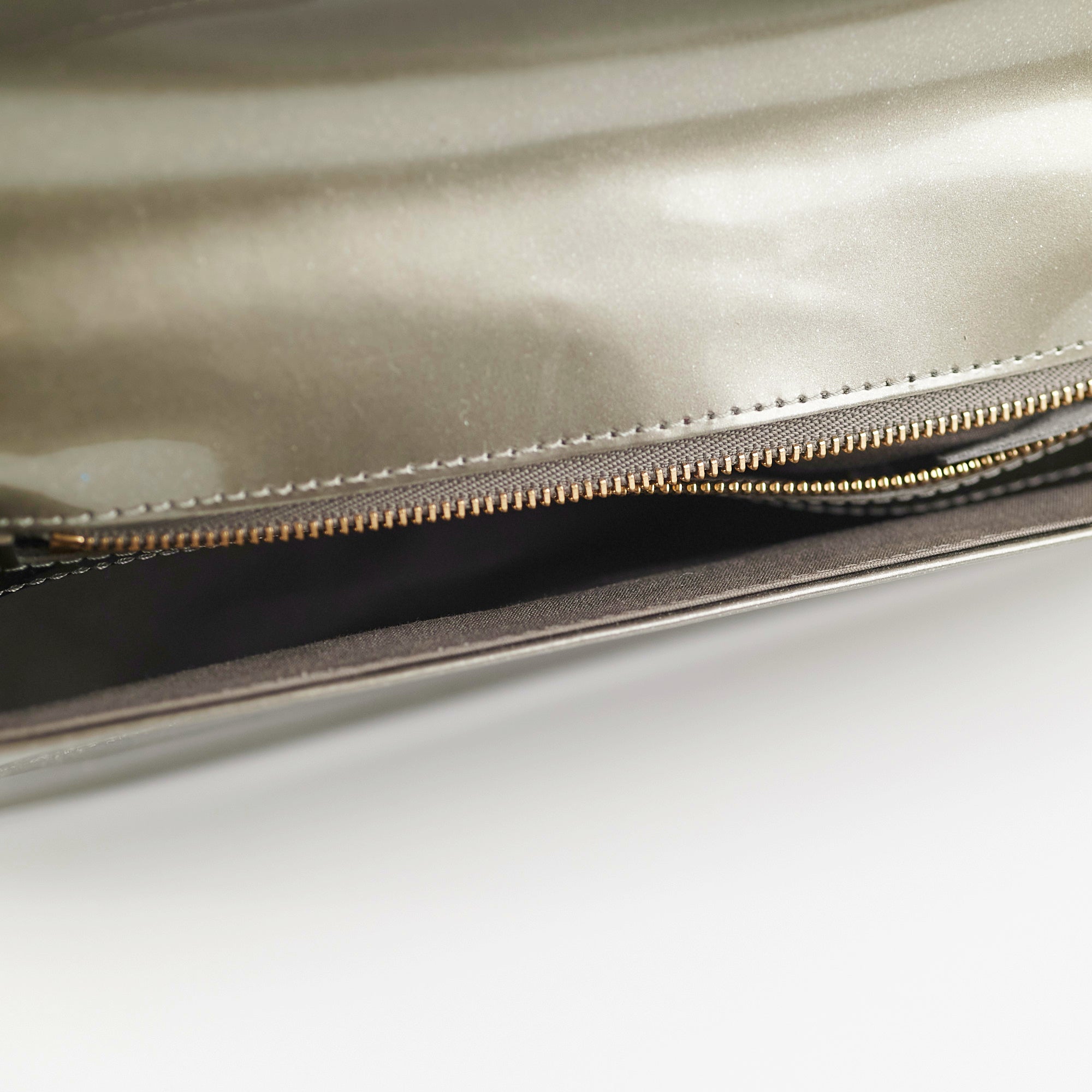 Grey patent outlet clutch bag