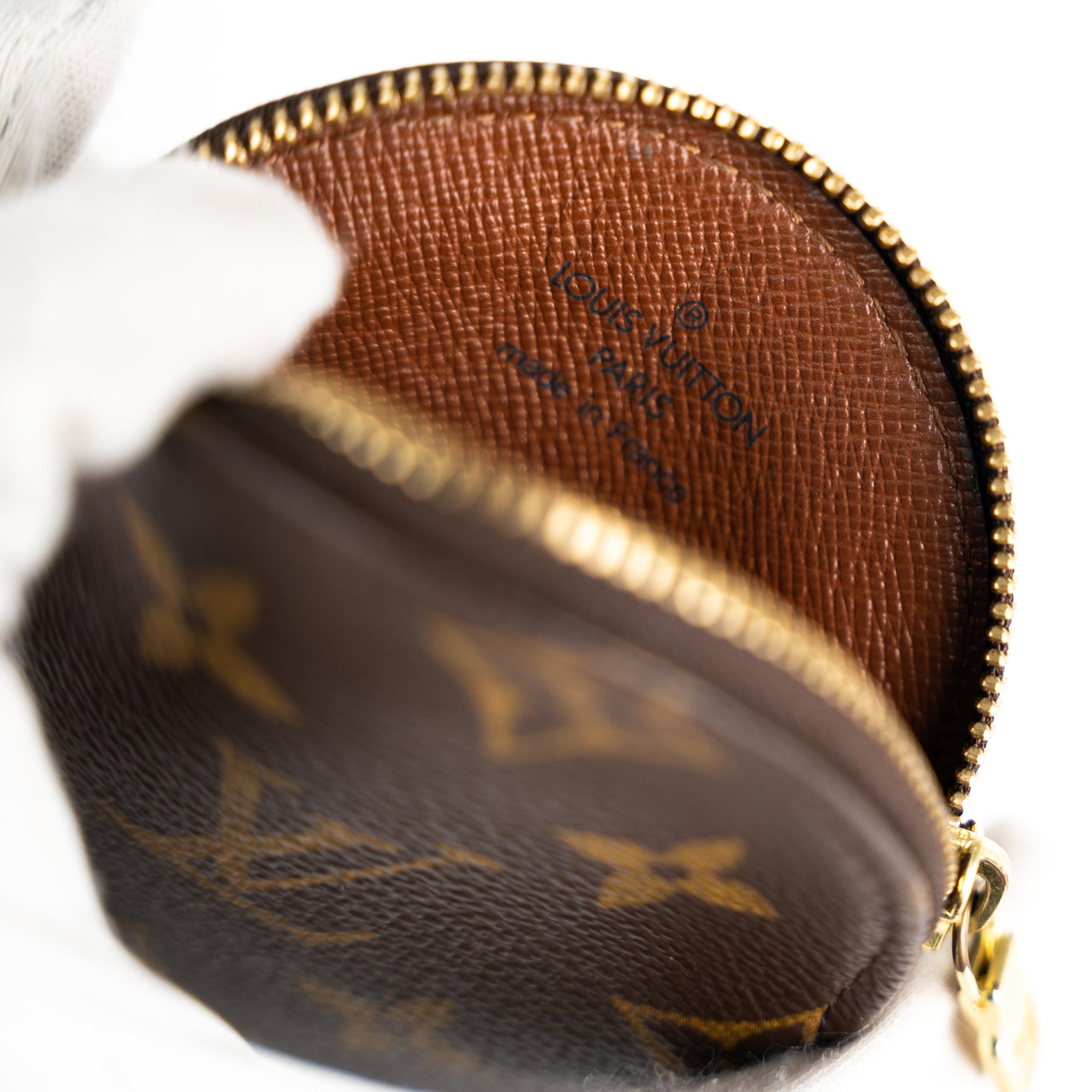 Lot 2130 - Louis Vuitton Monogram Coin Purse, on gilt