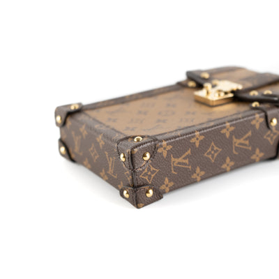 Shop Louis Vuitton Vertical trunk pochette (M67872) by LESSISMORE☆