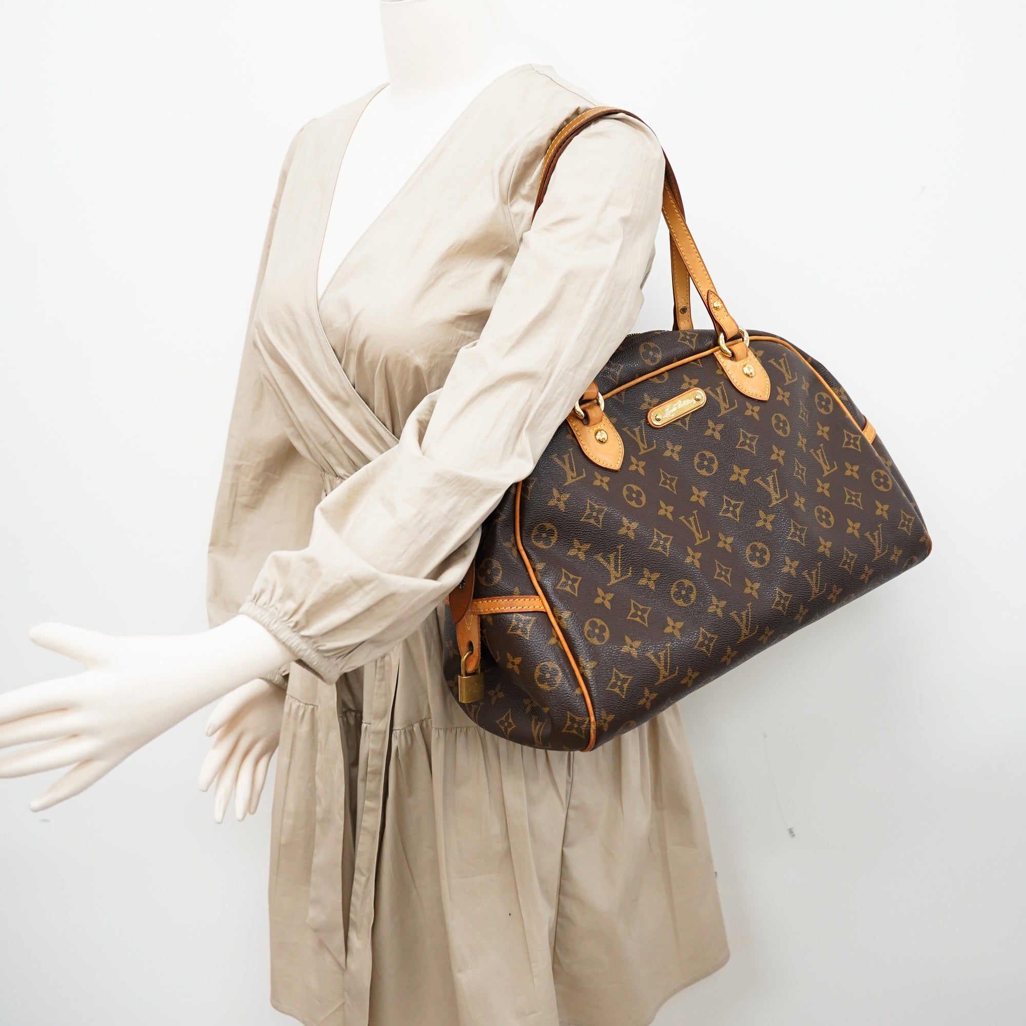 LOUIS VUITTON. Montorgueil model. Handbag in monogram c…