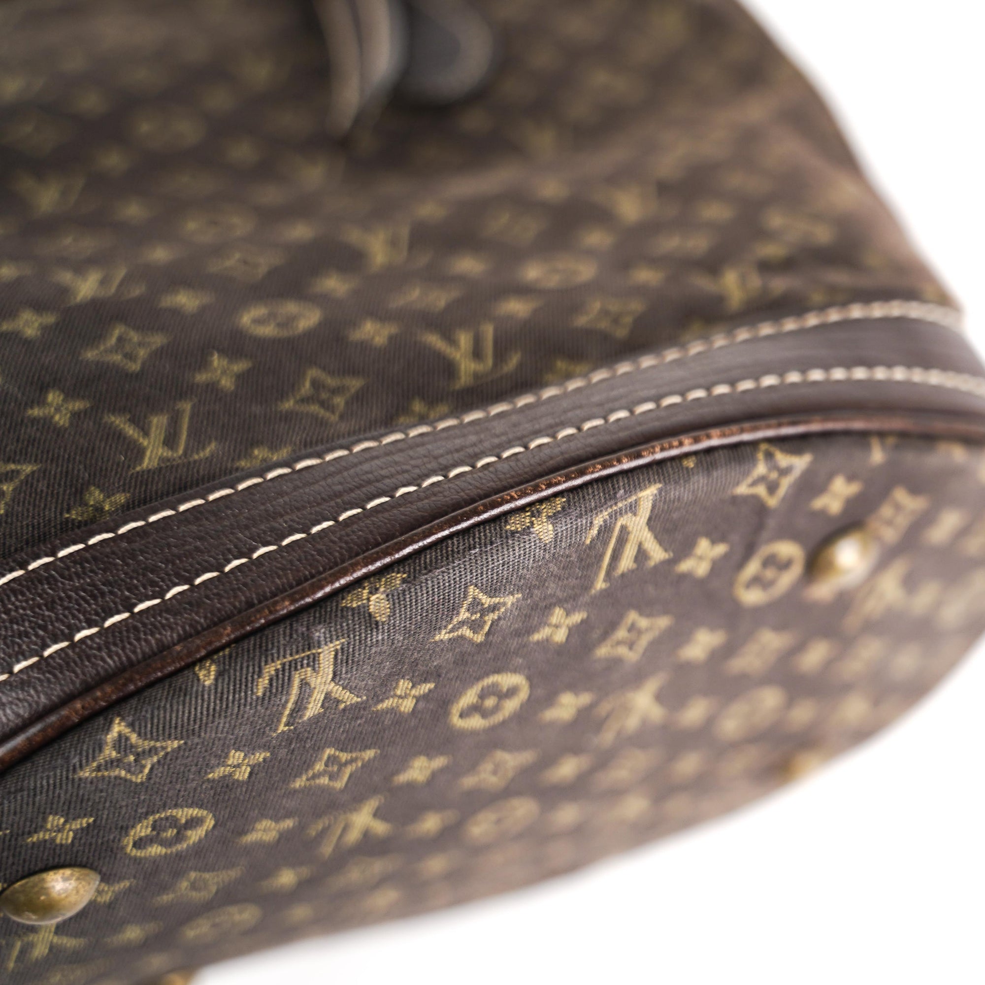 Bucket cloth handbag Louis Vuitton Brown in Cloth - 25097428