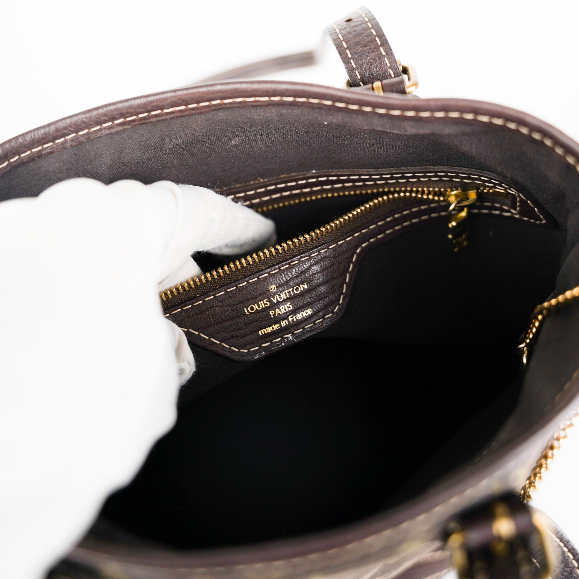 Bucket cloth handbag Louis Vuitton Brown in Cloth - 32604399
