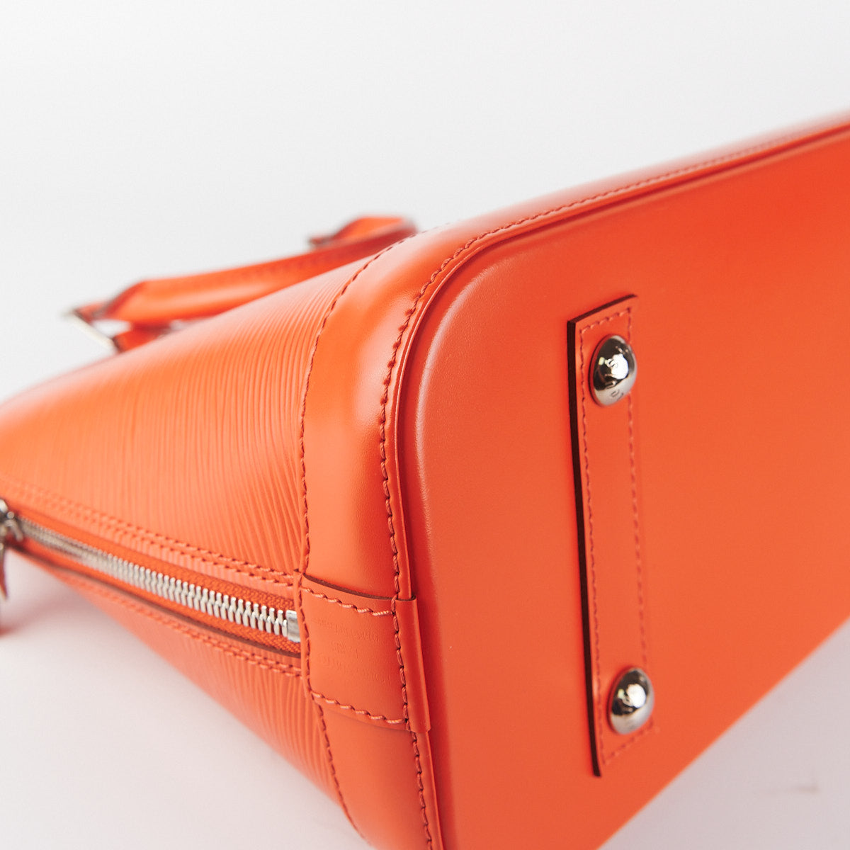 Louis Vuitton Orange Epi Alma PM ○ Labellov ○ Buy and Sell Authentic Luxury
