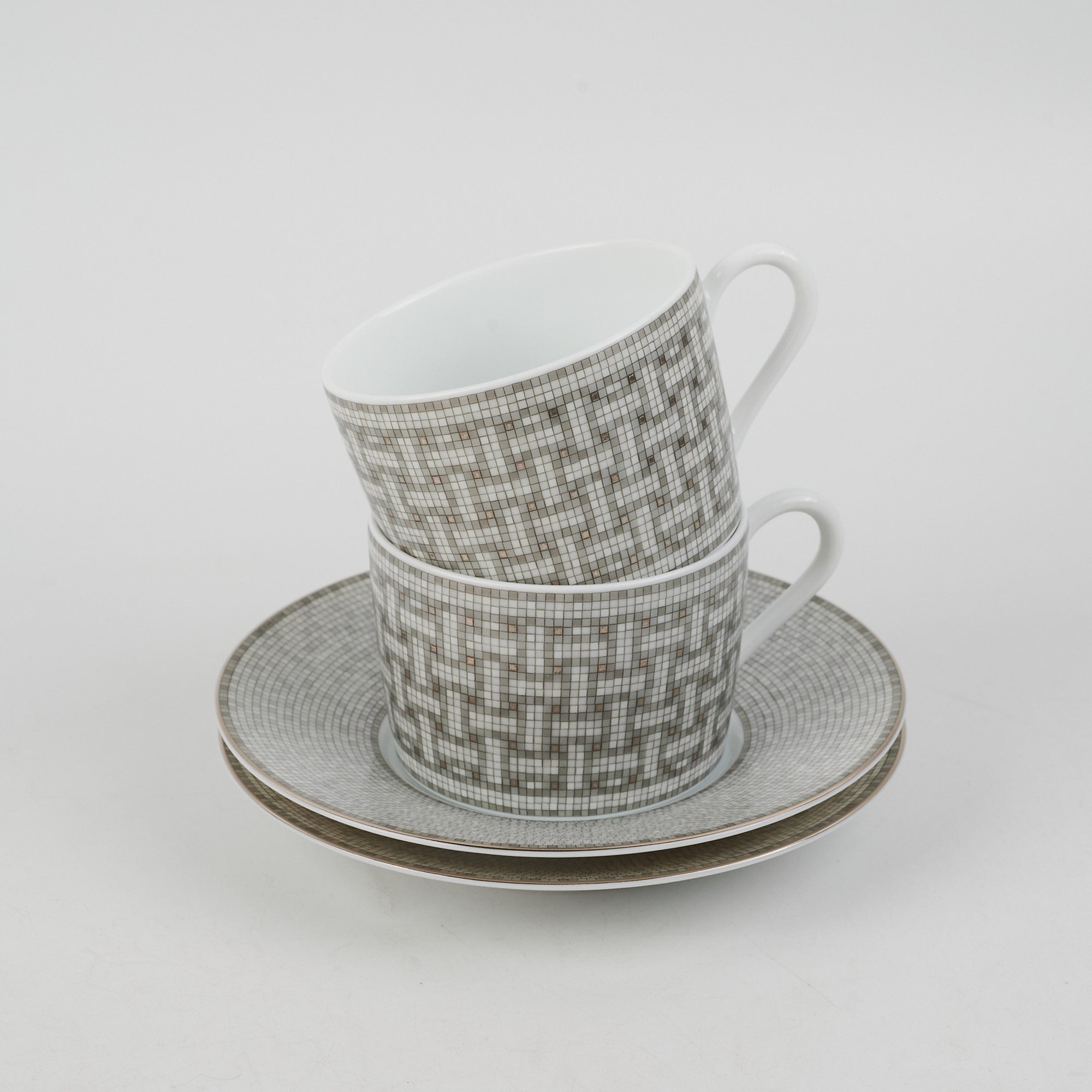 Hermes Mosaique Au 24 Porcelain Tea Cup and Saucer Set – Madison Avenue  Couture