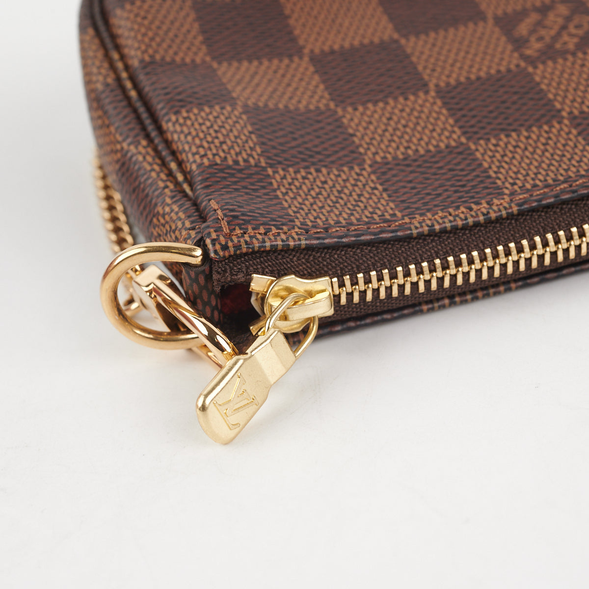 Louis Vuitton Damier Ebene Mini Pochette - Luxury In Reach