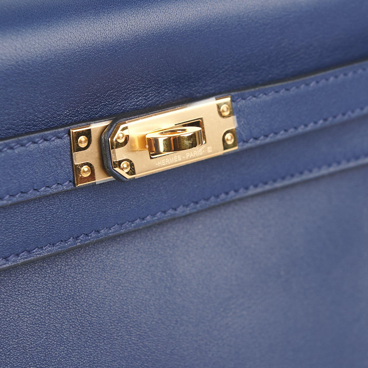 A BLEU ÉLECTRIQUE SWIFT LEATHER RETOURNÉ KELLY 25 WITH GOLD HARDWARE, HERMÈS,  2017